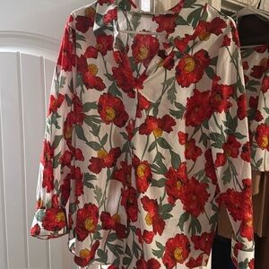 Match set, long sleeve button up, and skort set. Both size large